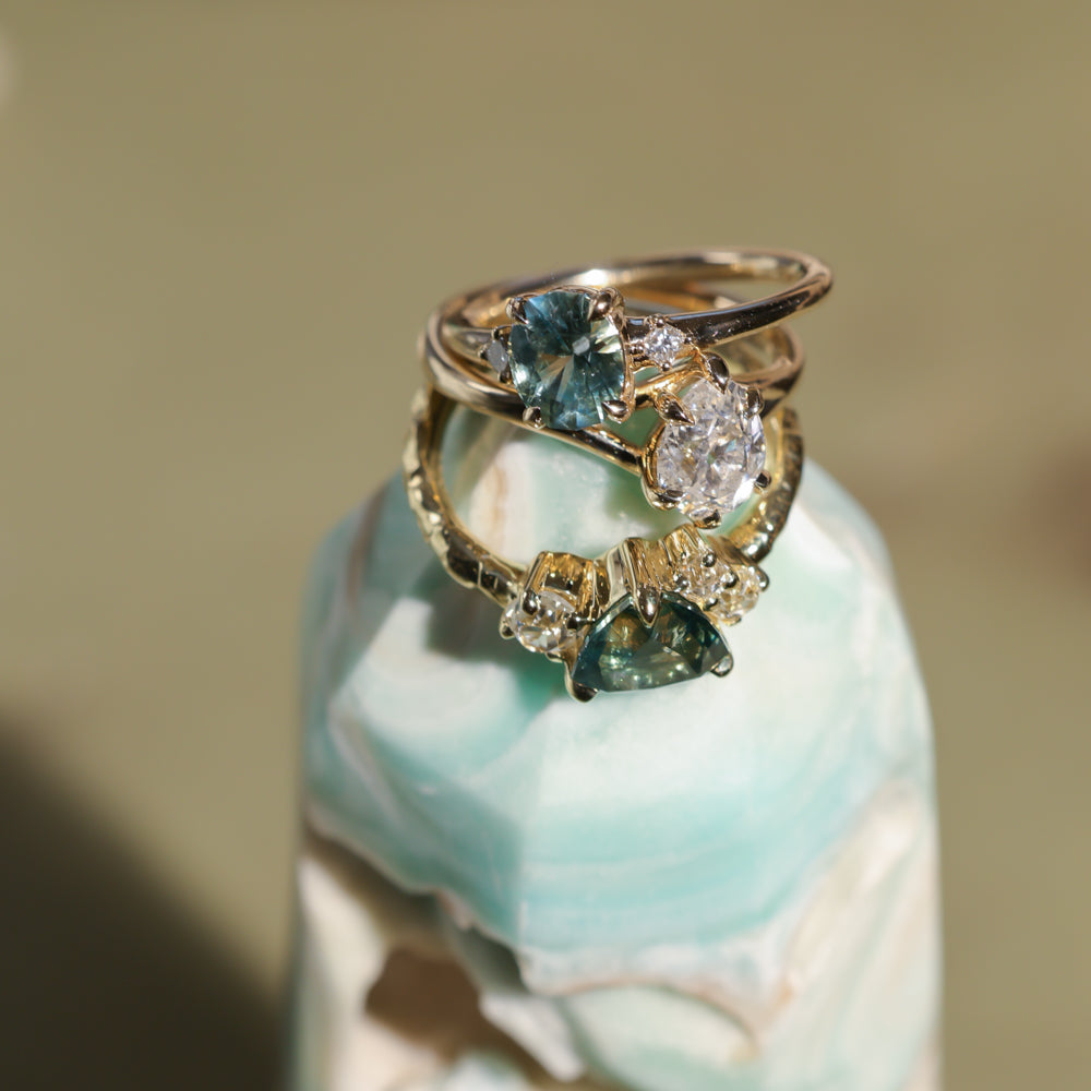 1.20ct Oval Brilliant Teal Montana Sapphire and Princess Cut Diamond Rapids Low Profile Ring in 14k Yellow Gold