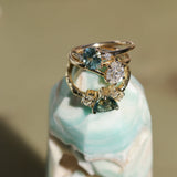 1.20ct Oval Brilliant Teal Montana Sapphire and Princess Cut Diamond Rapids Low Profile Ring in 14k Yellow Gold
