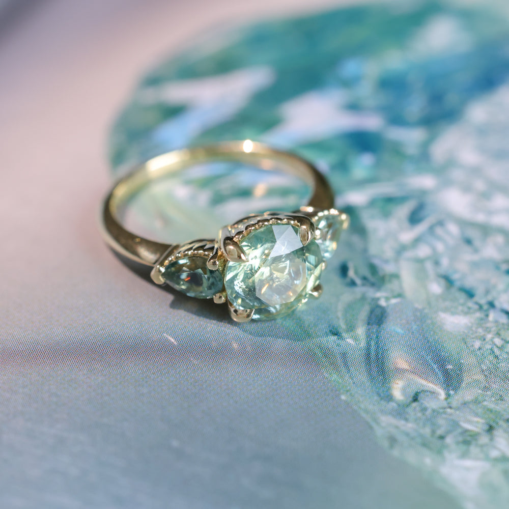 2.75ct Round Untreated Parti Montana Sapphire and Pear Montana Sapphire Three Stone Low Profile Scallop Ring in 18k Yellow Gold