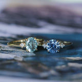 2.01ct Oval Precision Cut Denim Blue Untreated Montana Sapphire and Princess Cut Diamond Rapids Low Profile Ring in 18k Yellow Gold