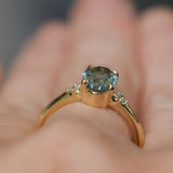 2.01ct Oval Precision Cut Denim Blue Untreated Montana Sapphire and Princess Cut Diamond Rapids Low Profile Ring in 18k Yellow Gold