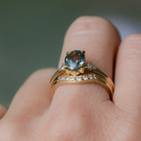 2.01ct Oval Precision Cut Denim Blue Untreated Montana Sapphire and Princess Cut Diamond Rapids Low Profile Ring in 18k Yellow Gold