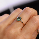 1.98ct Oval Precision Cut Teal Montana Sapphire and Princess Cut Diamond Rapids Low Profile Ring in 14k Yellow Gold