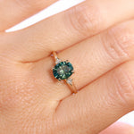 1.98ct Oval Precision Cut Teal Montana Sapphire and Princess Cut Diamond Rapids Low Profile Ring in 14k Yellow Gold