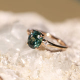 1.98ct Oval Precision Cut Teal Montana Sapphire and Princess Cut Diamond Rapids Low Profile Ring in 14k Yellow Gold