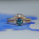 0.85ct Oval Deep Teal Montana Sapphire and Princess Cut Diamond Rapids Low Profile Ring in 14k Yellow Gold