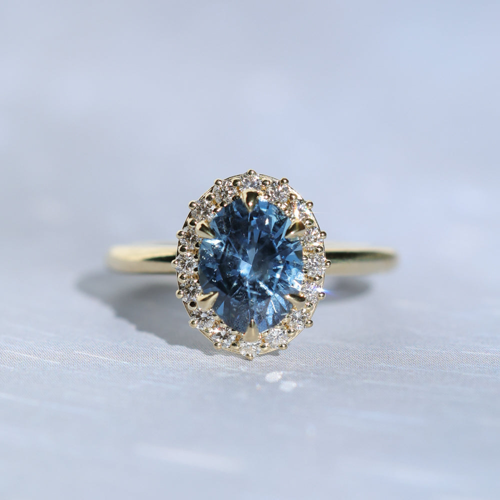 2.52ct Oval Untreated Montana Sapphire Antique-Style Diamond Halo Ring in 18k Yellow Gold