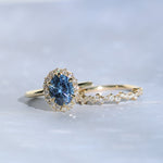 2.52ct Oval Untreated Montana Sapphire Antique-Style Diamond Halo Ring in 18k Yellow Gold