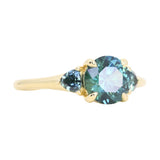 1.82ct Round Teal Precision Cut Montana Sapphire and Trillion Sapphire Low Profile Three Stone Ring in 18k Yellow Gold