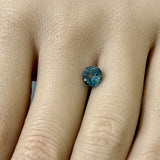 1.39CT ROUND PRECISION CUT MONTANA SAPPHIRE, TEAL GREEN WITH BLUE, 6.7MM