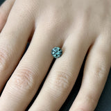 1.57CT ROUND PRECISION CUT MONTANA SAPPHIRE, BLUE GREEN, 6.91X4.55MM