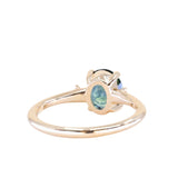 1.98ct Oval Precision Cut Teal Montana Sapphire and Princess Cut Diamond Rapids Low Profile Ring in 14k Yellow Gold
