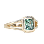 1.20ct Radiant Cut Seafoam Montana Sapphire Split Shank Bezel Ring with Milgrain in 14k Yellow Gold