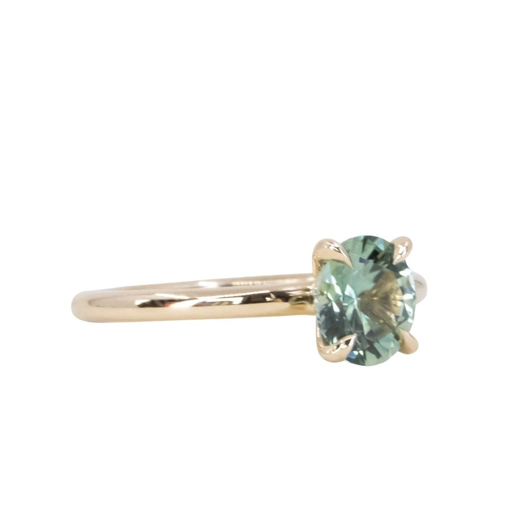 1.33ct Oval Light Teal Green Montana Sapphire Classic 4 Prong Solitaire in 14k Yellow Gold