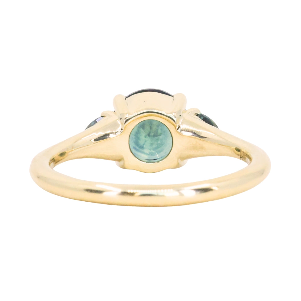 1.82ct Round Teal Precision Cut Montana Sapphire and Trillion Sapphire Low Profile Three Stone Ring in 18k Yellow Gold