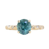 2.35ct Silky Roval Montana Sapphire 4 Prong Evergreen Solitaire with Scattered Embedded Diamonds in 14k Yellow Gold