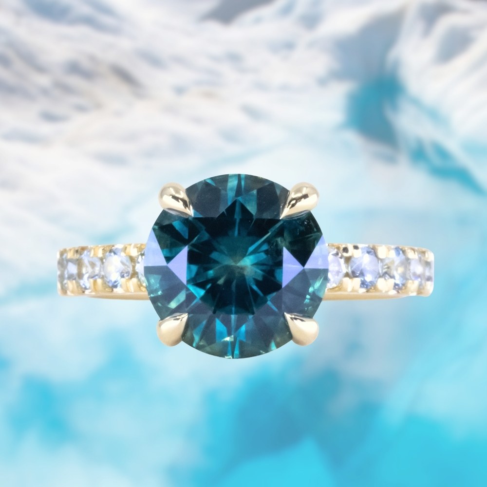 3.84ct Round Ocean Blue Teal Montana Sapphire Low Profile 4 Prong Ring with French Set Precision Cut White Montana Sapphires in 18k Yellow Gold