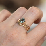 1.71ct Precision Cut Oval Montana Sapphire Diamond-studded Sea Star Solitaire in 14k Yellow Gold