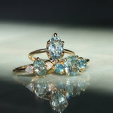 1.74ct Unheated Oval Montana Sapphire and Madagascar Sapphire Low Profile Three Stone Ring in 18k Yellow Gold