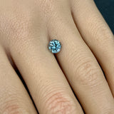 1.40CT ROUND BRILLIANT PRECISION CUT MONTANA SAPPHIRE, LIGHT TEAL, 6.4MM