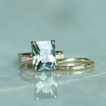 6.19ct Untreated Teal Radiant Cut Sapphire and Double Band 4 Prong Stackable Solitaire in 18k Yellow Gold