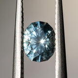 0.84CT FANCY OVAL PRECISION CUT MONTANA SAPPHIRE, SILVERY BLUE, 6.01X3.88MM
