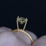 1.27CT PRECISION CUT OVAL MONTANA SAPPHIRE, OLIVE GREEN AND YELLOW, 6.89X5.84X4.36MM