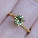 1.27CT PRECISION CUT OVAL MONTANA SAPPHIRE, OLIVE GREEN AND YELLOW, 6.89X5.84X4.36MM