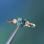 1.36ct Oval Montana Sapphire and Lab Diamond Three Stone Ring in 14K Yellow Gold with Evergreen Texture