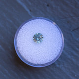 1.20CT ROUND PRECISION CUT MONTANA SAPPHIRE, SHIMMERY AQUA BLUE, UNTREATED, 6X4.1MM