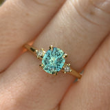 1.20ct Oval Brilliant Teal Montana Sapphire and Princess Cut Diamond Rapids Low Profile Ring in 14k Yellow Gold