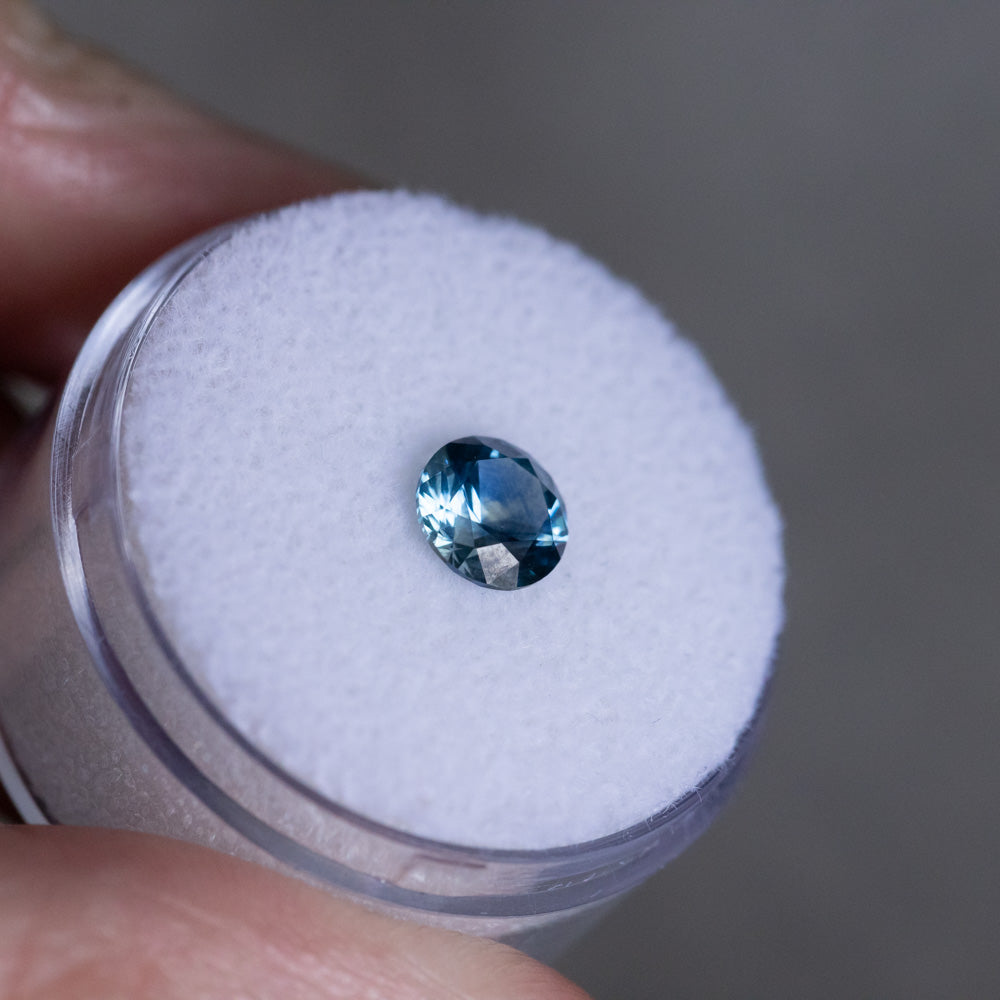 1.19CT ROUND PRECISION CUT MONTANA SAPPHIRE, OCEAN BLUE TEAL, 6X4MM