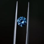 1.19CT ROUND PRECISION CUT MONTANA SAPPHIRE, OCEAN BLUE TEAL, 6X4MM