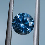 1.19CT ROUND PRECISION CUT MONTANA SAPPHIRE, OCEAN BLUE TEAL, 6X4MM