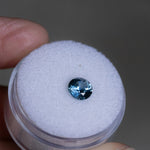 1.14CT ROUND PRECISION CUT MONTANA SAPPHIRE, OCEAN BLUE WITH SOME PURPLE COLOR SHIFTING, 6X4MM