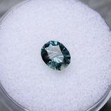 SET IN STOCK RING 1.36CT PRECISION CUT OVAL MONTANA SAPPHIRE, MEDIUM TEAL BLUE GREY, 7X5.4MM