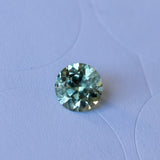 1.79CT ROUND PRECISION CUT MONTANA SAPPHIRE, LIGHT GREEN WITH PARTI BLUE, 7.3x4.71MM EARLY ACCESS