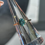 1.98ct Oval Precision Cut Teal Montana Sapphire and Princess Cut Diamond Rapids Low Profile Ring in 14k Yellow Gold