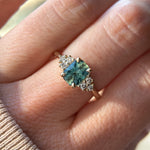 1.55ct Precision Radiant Cut Teal Montana Sapphire and Diamond Cluster Evergreen Ring in 14k Yellow Gold