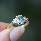 1.55ct Precision Radiant Cut Teal Montana Sapphire and Diamond Cluster Evergreen Ring in 14k Yellow Gold