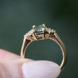 1.55ct Precision Radiant Cut Teal Montana Sapphire and Diamond Cluster Evergreen Ring in 14k Yellow Gold